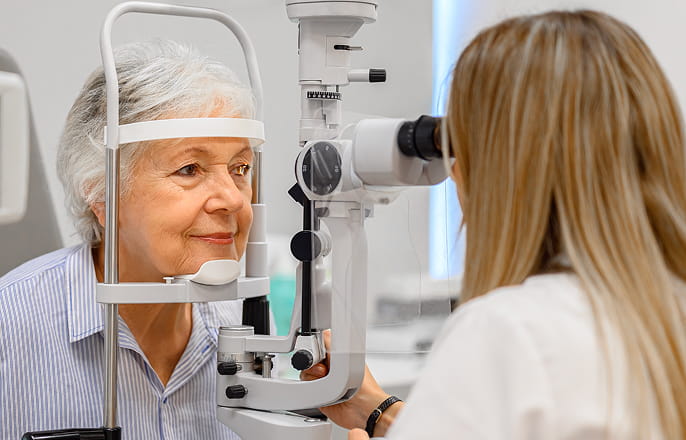 Woman undergo eye exam