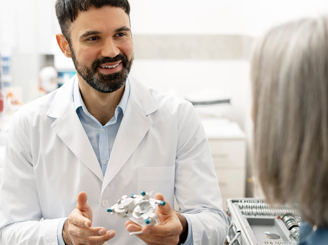 Optician examining the patient